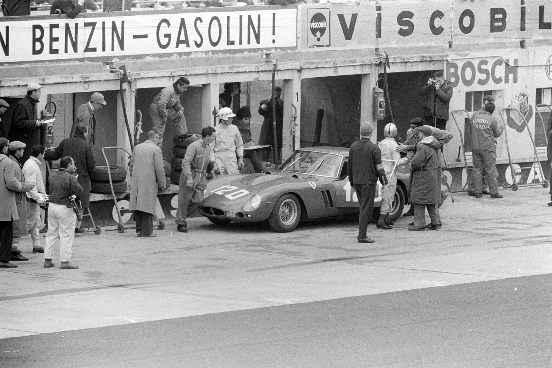 Chassis no. 3765, race #120, in pit lane during the Nürburgring 1000 kms at Nürburgring on 27 May 1962.