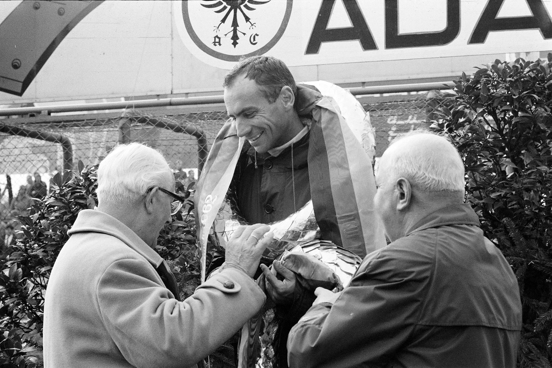 Willy Mairesse, 2nd position, on the podium following the Nürburgring 1000 kms at Nürburgring on 27 May 1962.